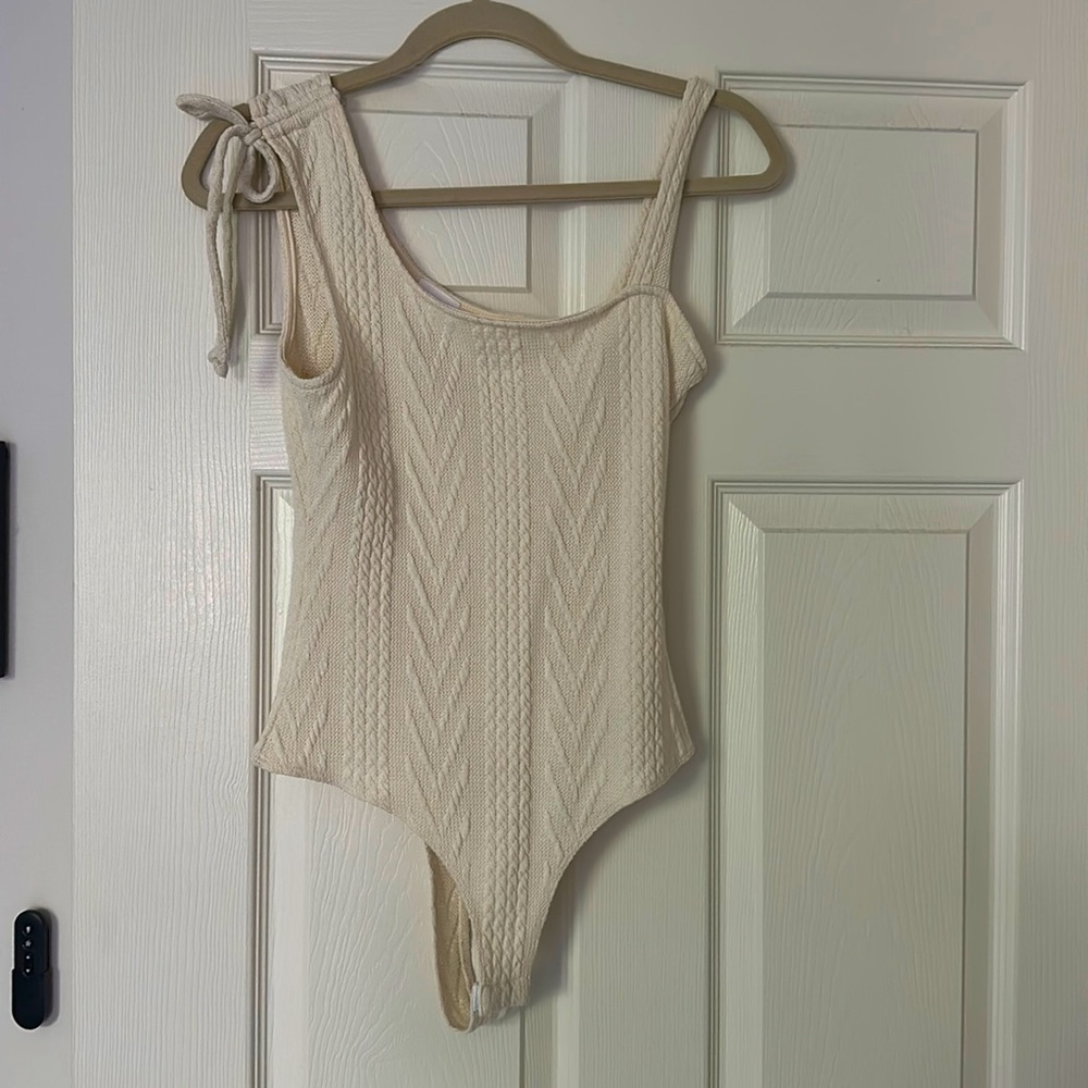 Cram colored thong body suite